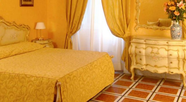 Guest room at Villa San Lorenzo Maria Hotel