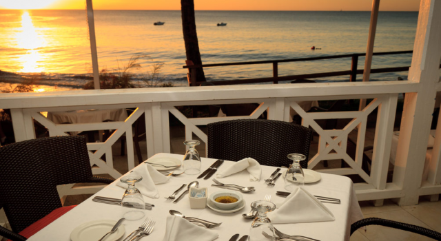 Beachfront restaurant at St. James's Club Morgan Bay